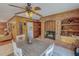 Dining area features a brick fireplace, adjacent to the laundry room and the living area at 382 Wimbledon Dr, Roxboro, NC 27573
