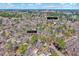 Aerial view of home at 3923 Wendy Ln, near NC State Fairgrounds in wooded neighborhood at 3923 Wendy Ln, Raleigh, NC 27606