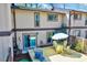 Backyard view of a wooden deck, chairs, table with umbrella, and backyard at 3923 Wendy Ln, Raleigh, NC 27606