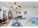 Bright bedroom features a comfortable bed, sofa, and functional layout at 3923 Wendy Ln, Raleigh, NC 27606