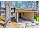 Attached carport featuring storage, room for vehicles and outdoor equipment, and convenient access to the home at 3923 Wendy Ln, Raleigh, NC 27606