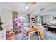Dining area adjacent to the living area with sliding door access to outdoor deck at 3923 Wendy Ln, Raleigh, NC 27606