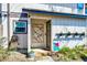 Street view of the front entrance featuring flowerpots and creative front door decor at 3923 Wendy Ln, Raleigh, NC 27606