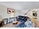 Bright and spacious living room featuring wood-look flooring and comfortable seating at 3923 Wendy Ln, Raleigh, NC 27606
