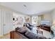 Open concept living room flows seamlessly into the dining area and offers lots of natural light at 3923 Wendy Ln, Raleigh, NC 27606