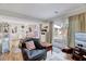 Cozy living area provides access to an outdoor deck, perfect for relaxation and entertainment at 3923 Wendy Ln, Raleigh, NC 27606