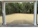 A view of a large backyard covered in straw awaiting new grass from an outdoor living space at 4012 Kingcraig Ln, Zebulon, NC 27597
