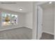 Bright bedroom with a large window and access to a walk-in closet at 4012 Kingcraig Ln, Zebulon, NC 27597