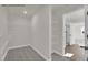 Walk-in closet with wire shelving and an open door looking into the bathroom at 4012 Kingcraig Ln, Zebulon, NC 27597