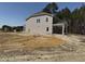 Two-story home featuring light siding and ample backyard space at 4012 Kingcraig Ln, Zebulon, NC 27597