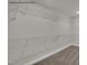 Walk-in closet equipped with multiple shelves for storage and plush carpeting at 4012 Kingcraig Ln, Zebulon, NC 27597