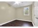 Bedroom featuring hardwood floors, a ceiling fan, and natural lighting at 402 Womble Dr, Lillington, NC 27546