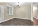 Neutral dining area with a chandelier and large window, with natural light at 402 Womble Dr, Lillington, NC 27546
