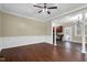 Elegant living room featuring hardwood floors, decorative molding, and open access to the kitchen, great for entertaining at 402 Womble Dr, Lillington, NC 27546