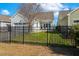 A fully fenced backyard, ideal for children and pets to roam freely at 405 Daisy Grove Ln, Holly Springs, NC 27540