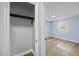 Bedroom featuring neutral paint, durable floors, a closet and a window with backyard views at 4509 Alamance Baptist Church Loop, Burlington, NC 27215