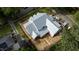 Aerial view showing new construction, a modern design, and surrounding residential neighborhood at 5107 Hearth Dr, Raleigh, NC 27609