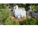 An aerial view shows the home under construction in an established neighborhood at 5107 Hearth Dr, Raleigh, NC 27609