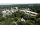 An aerial perspective that shows the house surrounded by lush greenery at 5107 Hearth Dr, Raleigh, NC 27609