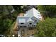Aerial view of new house construction, featuring modern design and surrounding neighborhood at 5107 Hearth Dr, Raleigh, NC 27609