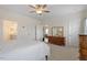 Bedroom with neutral carpet, wooden dresser, and ensuite bathroom and walk in closet at 5205 Sorrell Glen Dr, Raleigh, NC 27603