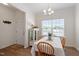 Dining room with hardwood floors, and lots of natural light at 5205 Sorrell Glen Dr, Raleigh, NC 27603