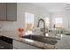 Kitchen features granite counters and views to the living room and dining area at 5205 Sorrell Glen Dr, Raleigh, NC 27603