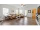 Inviting living room with ample seating and hardwood floors at 5205 Sorrell Glen Dr, Raleigh, NC 27603