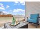 Cozy patio with outdoor seating and view of the backyard at 5205 Sorrell Glen Dr, Raleigh, NC 27603