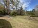 View of pond visible through backyard fence at 5486 B Us Hwy 301, Four Oaks, NC 27524