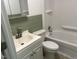Bathroom with shower-tub combo, toilet, and vanity at 5486 B Us Hwy 301, Four Oaks, NC 27524