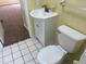 Well-lit bathroom featuring a vanity, white fixtures, and classic tile at 5486 B Us Hwy 301, Four Oaks, NC 27524