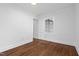 Bedroom with window, hardwood floors, and clean white walls provides a welcoming atmosphere at 55 Lindsey St, Pittsboro, NC 27312