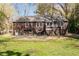 Two-story home with a large yard and back patio; great curb appeal and outdoor living space at 55 Lindsey St, Pittsboro, NC 27312