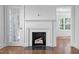 Classic fireplace featuring traditional wood logs at 55 Lindsey St, Pittsboro, NC 27312