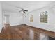 Spacious living room with hardwood flooring and bright, natural light at 55 Lindsey St, Pittsboro, NC 27312