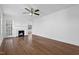 Living room with a traditional fireplace at 55 Lindsey St, Pittsboro, NC 27312