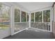 Screened porch provides a shaded outdoor space, perfect for enjoying nature while staying protected at 55 Lindsey St, Pittsboro, NC 27312