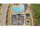 Overhead shot of the community clubhouse, pool, playground and outdoor entertainment space at 715 White Oak Pond Rd, Apex, NC 27523