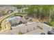 Aerial image of community amenities including clubhouse, pool, playground, and parking area at 715 White Oak Pond Rd, Apex, NC 27523