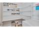 Walk-in pantry with ample shelving and storage space for organized kitchen essentials at 715 White Oak Pond Rd, Apex, NC 27523