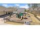 Community playground features slides and climbing structures, perfect for Gathering fun at 715 White Oak Pond Rd, Apex, NC 27523