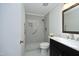 Updated bathroom with a tiled shower, grab bars, and a modern vanity at 716 Red Forest Trl, Raleigh, NC 27615