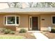 Charming exterior with beautiful bay window and well-manicured landscaping at 716 Red Forest Trl, Raleigh, NC 27615
