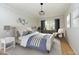 Serene main bedroom featuring a comfortable bed, soothing colors, and natural light at 716 Red Forest Trl, Raleigh, NC 27615