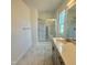 Modern bathroom featuring glass shower doors and a single sink at 75 Furley St., Homesite 115, Sanford, NC 27330