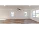 Bright and airy living room with hardwood floors and ample natural light at 75 Furley St., Homesite 115, Sanford, NC 27330