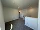 Upstairs loft area with plush carpeting and natural light at 75 Furley St., Homesite 115, Sanford, NC 27330