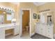Primary bathroom features double sinks, ample counter space, and separate vanity area at 805 Lee St, Gibsonville, NC 27249