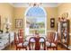 Dining area with charming table set and a bright window at 805 Lee St, Gibsonville, NC 27249
